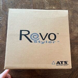 New REVO Anti Tangle System Hair
Styler Rotating Hairbrush Kit